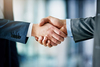STOCK handshake deal merger acquisition